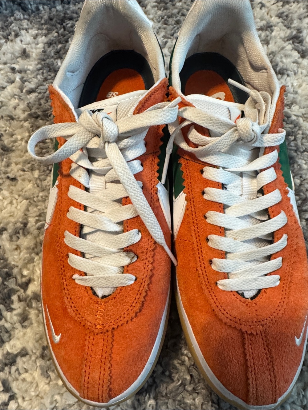Nike Orange Suede Sneakers with White Laces and Green Swoosh